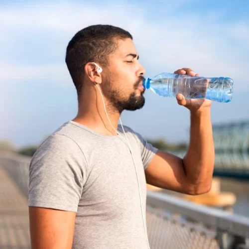 Glass of water and electrolytes for dehydration prevention